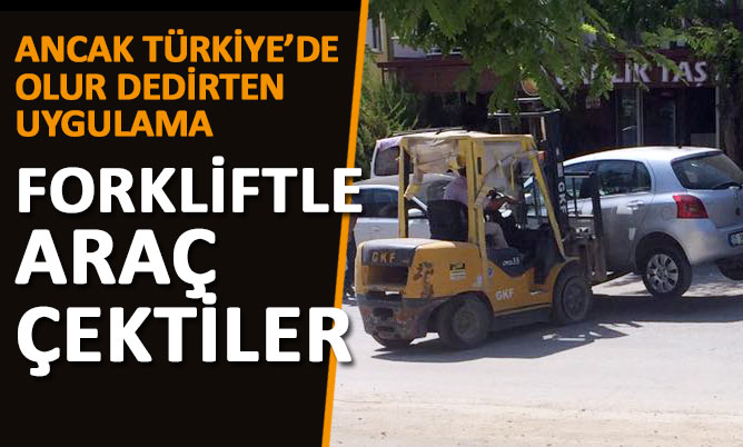 Pamukkale Belediyesi’nin kaldırım çalışmasını yapan taşeron firma çalışanları forklift ile araçları çekti