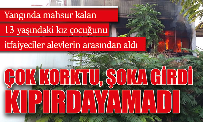Yangında mahsur kalan 13 yaşındaki kız çocuğunu itfaiyeciler alevlerin arasından aldı