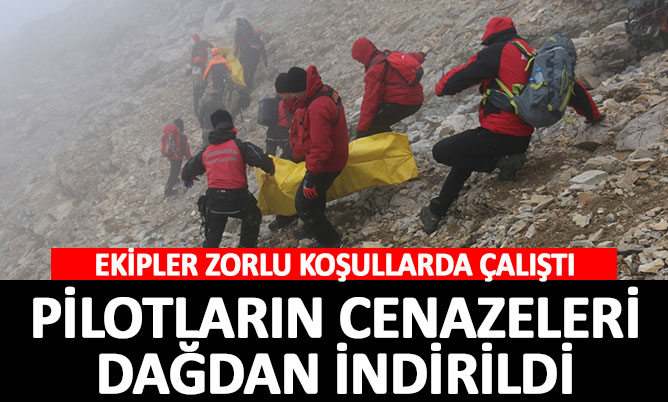 Pilotların cenazeleri dağdan indirildi