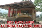 DEV KAYALARIN ALTINDA KALIYORLARDI