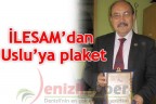 İLESAM’dan Uslu’ya plaket