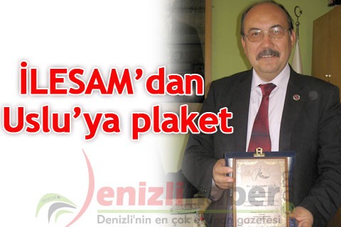 İLESAM’dan Uslu’ya plaket