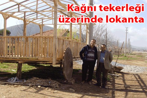 Kağnı tekerleği üzerinde lokanta