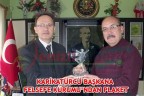 KARİKATÜRCÜ BAŞKANA FELSEFE KURUMU’NDAN PLAKET