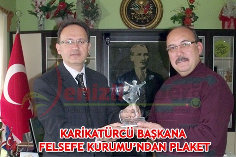 KARİKATÜRCÜ BAŞKANA FELSEFE KURUMU’NDAN PLAKET