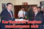 Karikatürist başkan mazbatasını aldı