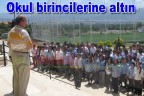 ”Okul birincilerine altın