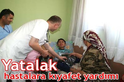 Yatalak hastalara kıyafet yardımı