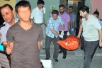 Ablasının başını kesti