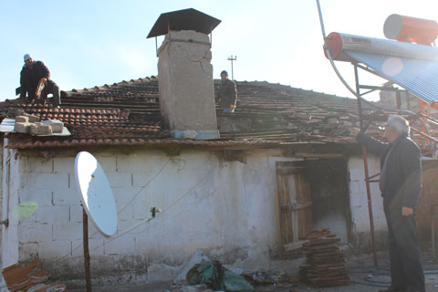 Yanan evini belediye yenileyecek