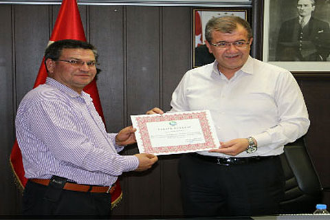 Çalışan işçiler, ödüllendirilen amir