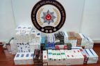 Polisten sahte para ve kaçak sigara operasyonu