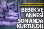 Bebekli kadın, devrilen iskeleden saniyelerle kurtulmuş