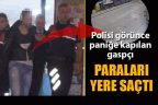 Polisi görünce cama çarpan gaspçı, paraları yere saçtı