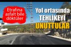 Yolu asfaltladılar ama direk yerinde kaldı