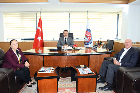 MHP’nin adayı Leman Kalkan DTO Başkanı Erdoğan’ı ziyaret etti