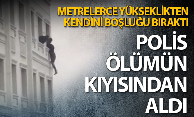 Polis intihar girişiminde bulunan kadını kurtardı