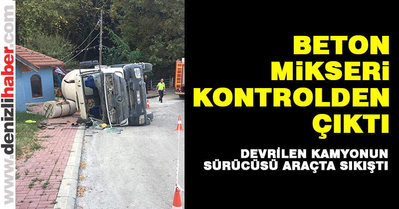 Devrilen kamyonun sürücüsü araçta sıkıştı