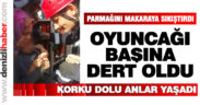 Makarayla oynarken parmağını sıkıştırdı