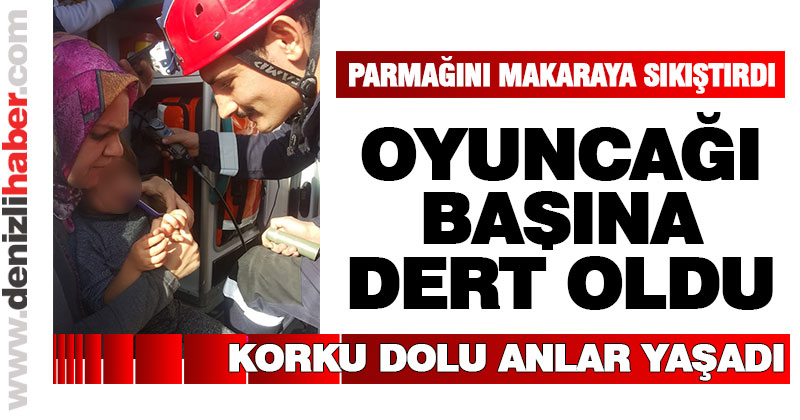 Makarayla oynarken parmağını sıkıştırdı