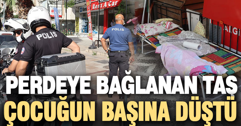 Perdeye bağlanan taş 4 yaşındaki çocuğun kafasına düştü
