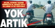 Kendilerinin takması gereken maskelerle plakalarını gizleyen gençler trafikte görüntülendi