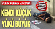 Sıcaktan bunalan satıcı çocuk, kaldırımda uyuyakaldı