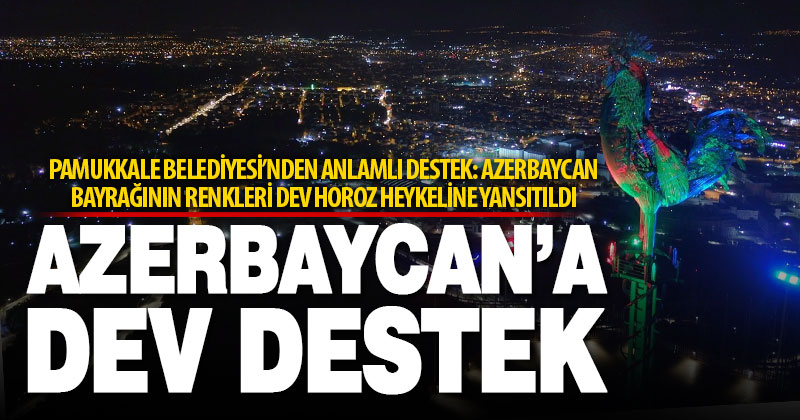 Azerbaycan bayrağının renkleri ışıkla 27 metrelik horoz heykeline yansıtıldı