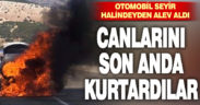 Seyir halinde yanan otomobilden diğer sürücülerin uyarısıyla kurtuldular