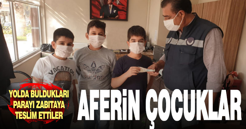 Çocuklar yolda buldukları parayı zabıtaya teslim etti