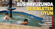 Sıcaktan bunalan çocuklar süs havuzunda serinledi