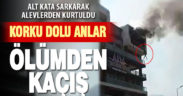 Apart dairesinde çıkan yangından alt kata sarkıp kurtuldu