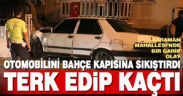 Çarptığı bahçe kapısına sıkışan otomobilin sürücüsü aracı terk edip kaçtı