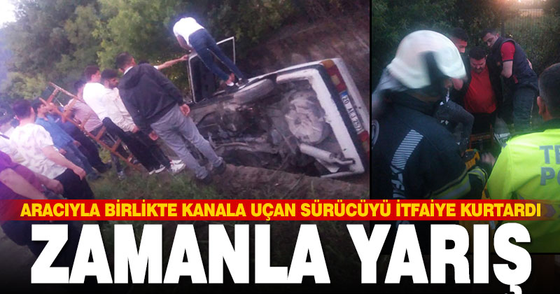 Aracıyla birlikte kanala uçan sürücüyü itfaiye kurtardı