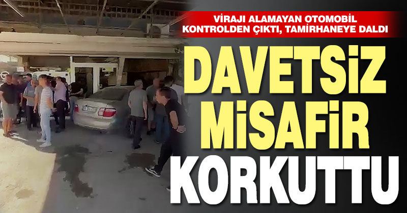 Virajı alamayan otomobil tamirhaneye daldı
