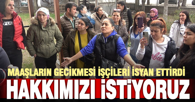 Bir grup işçi, maaşların geciktiği gerekçesiyle fabrika önünde eylem yaptı