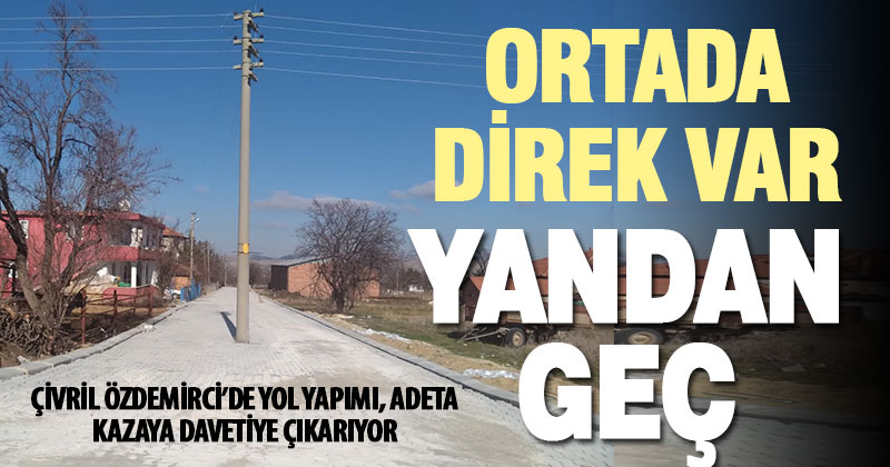 Yeni düzenlenen yolun ortasındaki elektrik direği tehlike oluşturuyor