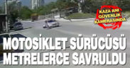 Otomobile çarpan motosiklet sürücüsü metrelerce savruldu