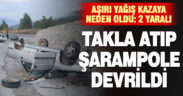 Takla atan otomobil şarampole devrildi