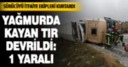 Yağmurda kayan tır devrildi:1 yaralı