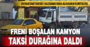 Freni boşalan kamyon taksi durağına daldı