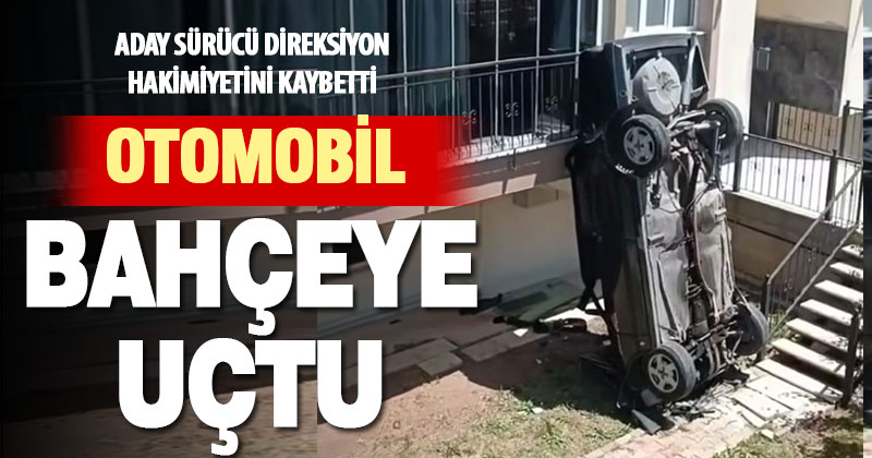 Aday sürücünün kullandığı otomobil apartmanın bahçesine uçtu