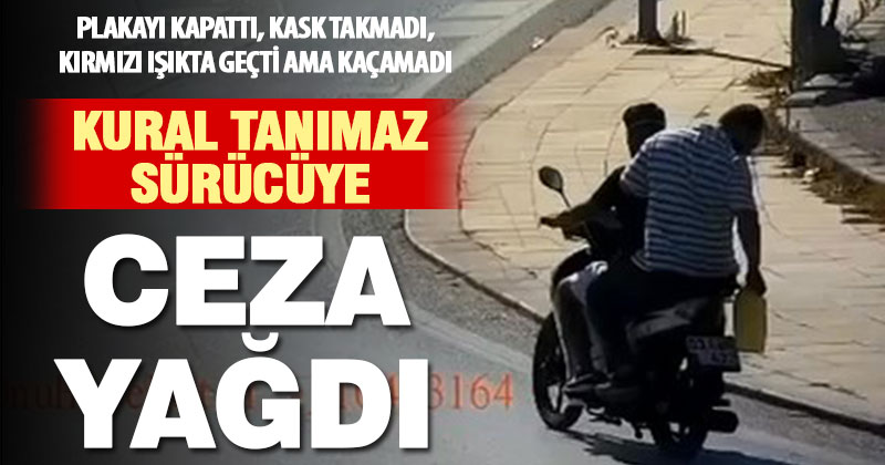 Plakayı kapatıp kırmızı ışıkta geçen sürücüye 7 bin lira ceza kesildi