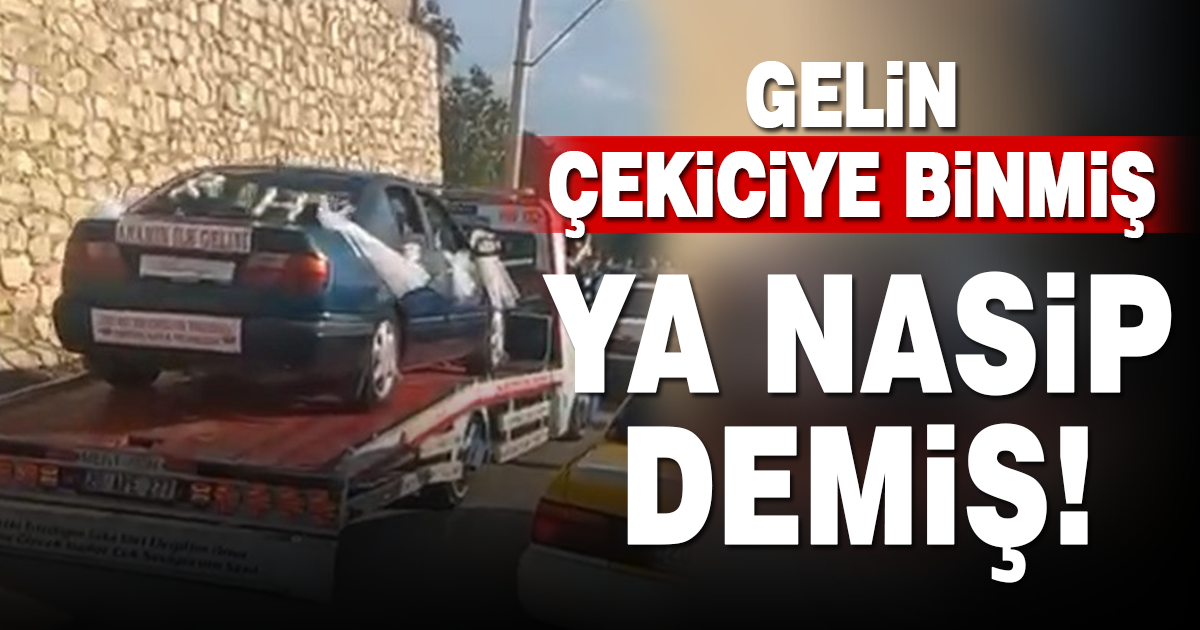 Bozulan gelin arabası yoluna çekicinin üzerinde devam etti