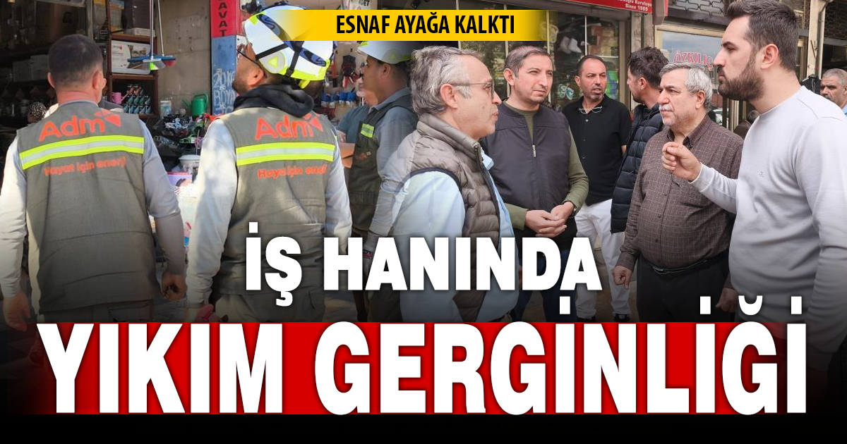 Denizli'de hukuki sürecin devam ettiği iş hanında yıkım hazırlıkları esnafı ayağa kaldırdı 